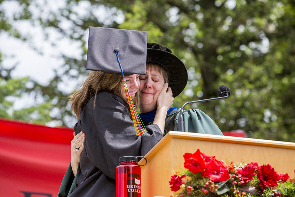 Lizzie Eason ’17 hugs Karen Shuman, professor of mathematics and statistics