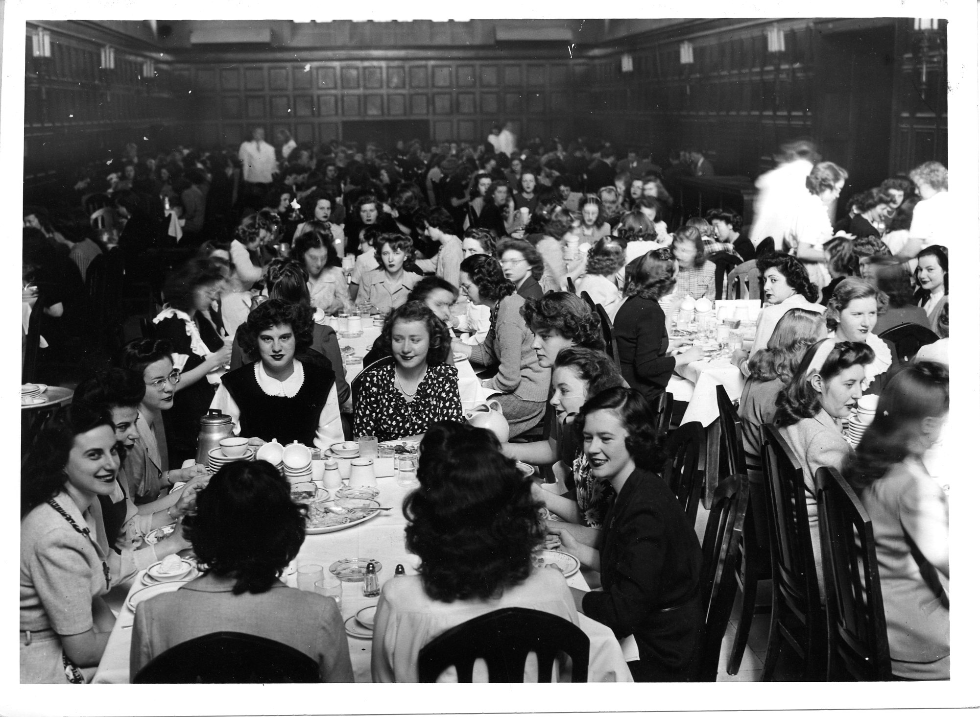 Black and white photo of women dining in Quad dining hall,1944