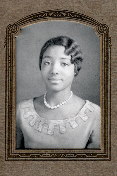 Portrait of a young black woman in a board frame with a decorative border