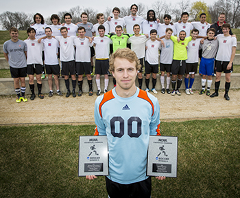 Isaiah Tyree ’15 with the 2014 men’s soccer team