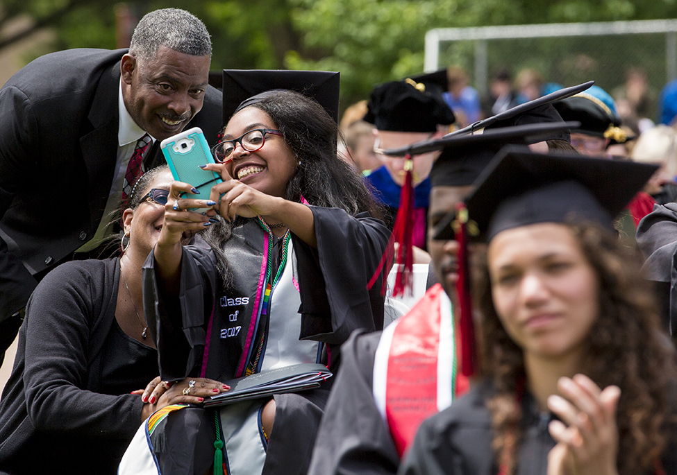 Gabrielle Matthews ’17 takes  a selfie with her family.