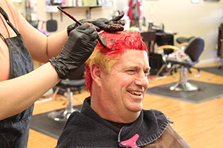 Andy Hamilton getting his hair dyed red