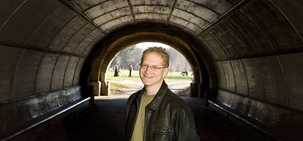 Tom Rayfiel standing in tunnel