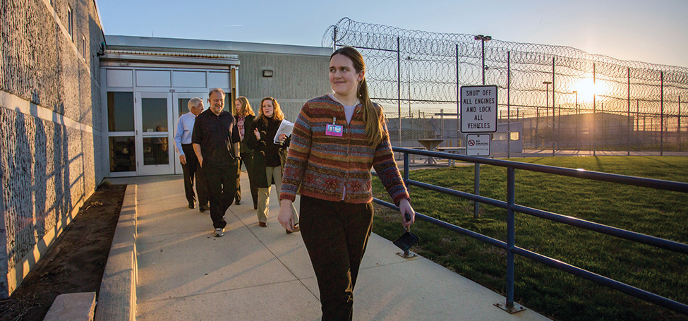 Emily Guenther and others at prison