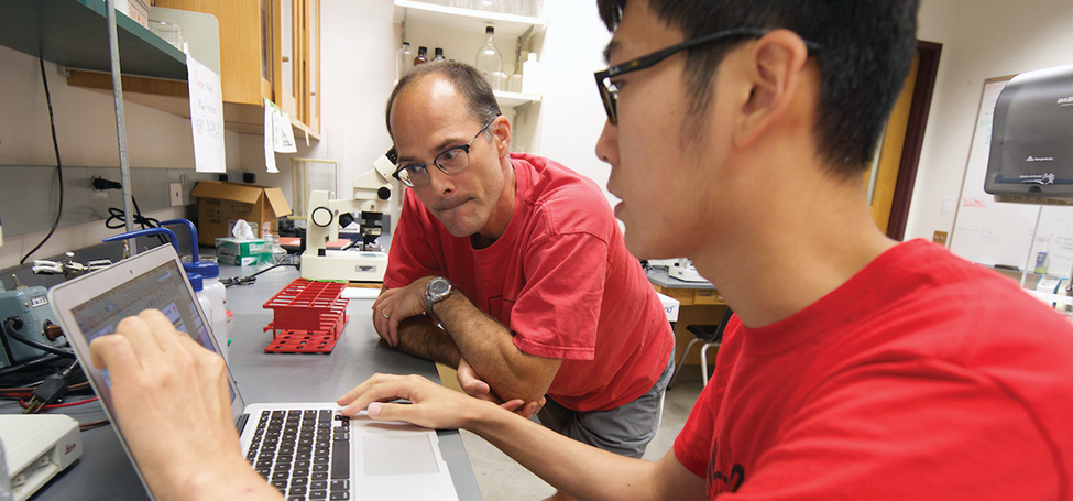 Mark Levandowski and student in lab